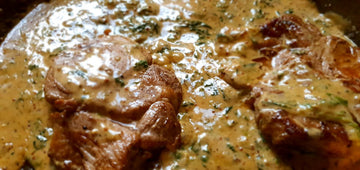 Creamy Mustard and Spinach Pork Rib-eye steaks