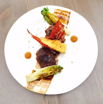 PIG CHEEKS WITH LIQUORICE, PINEAPPLE & PORK SHARDS