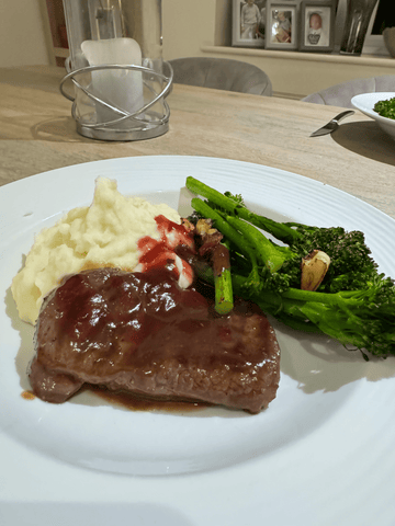 Venison Steak with port sauce, creamy mash & garlic chilli tenderstem broccoli